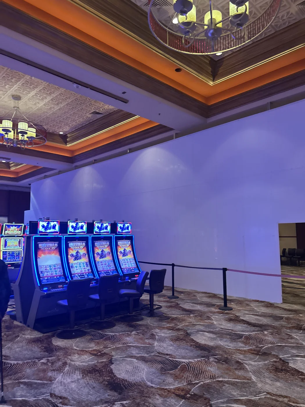 Casino slot floor barricade clean white wall