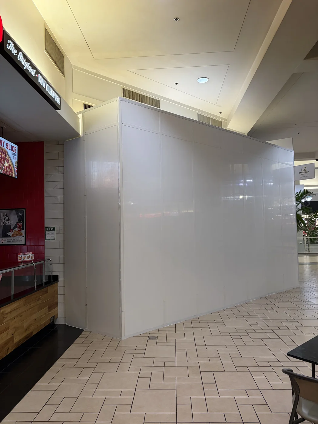 Mall food court barricade next to restaurant